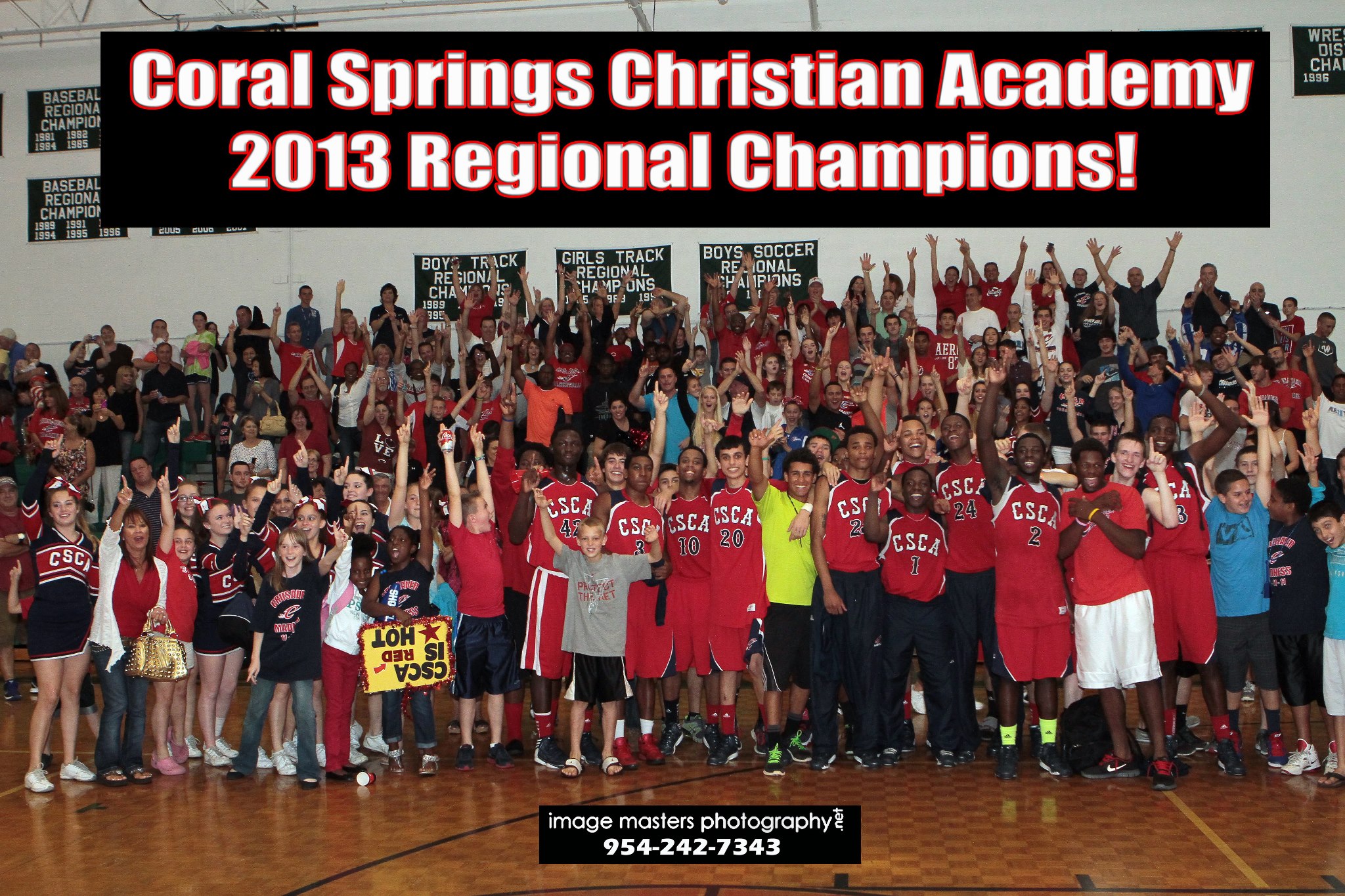 Athletics_Photo_2012_2013_Boys_Basketball_Varsity_Regional_Champions_With_Banner Athletics_Photo_2012_2013_Boys_Basketball_Varsity_Regional_Champions_With_Banner